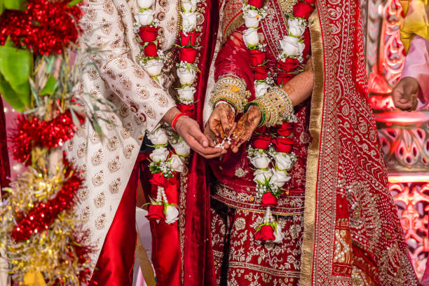 Home indian hindu wedding ceremony ritual items hands close up